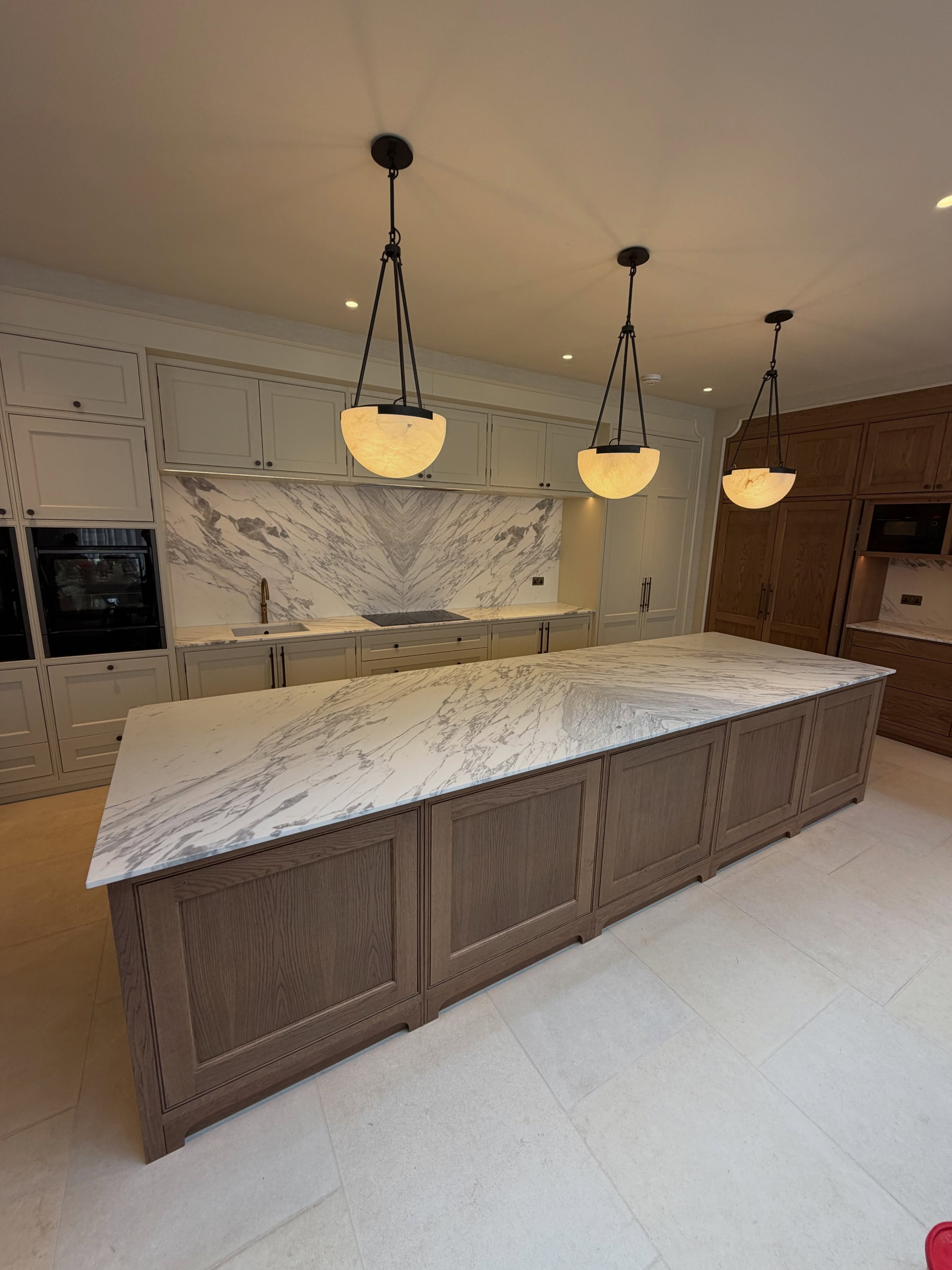 Natural Calacatta marble kitchen island from Italy by RH Stone Surfaces