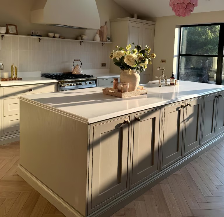 White quartz kitchen island with light grey cabinetry, RH Stone Surfaces serving Sunderland